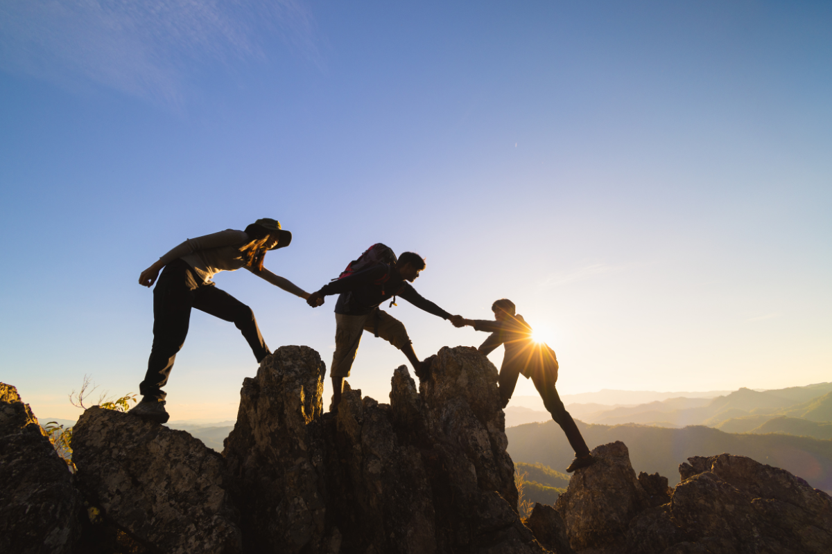 Group of people supporting each other